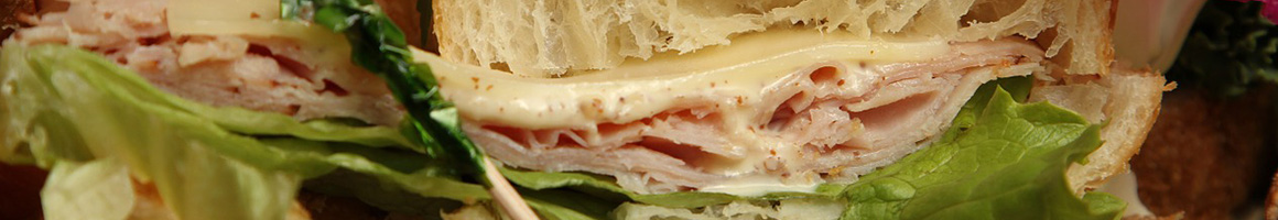 Eating Sandwich at Eat This Sandwiches restaurant in Redondo Beach, CA.
